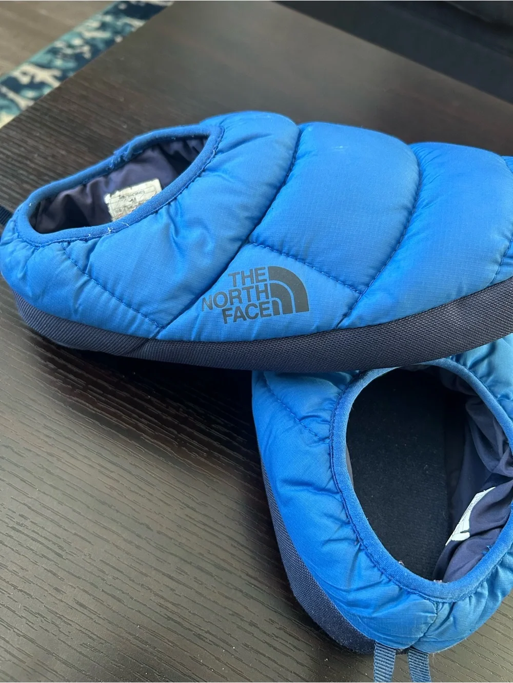 The North Face men’s ThermoShoes - Blue Cozy Slip-Ons